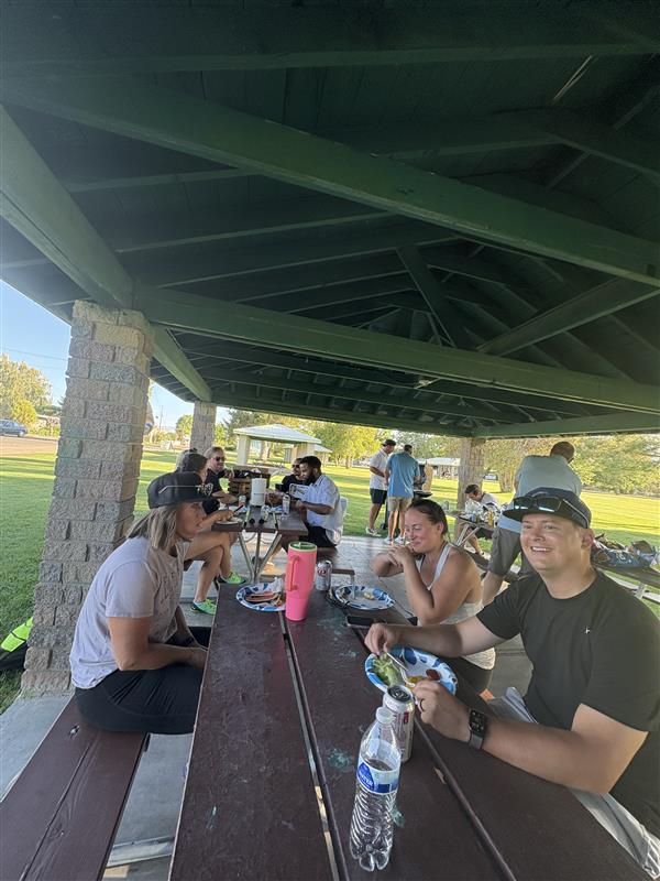 The Nifty team enjoys catered lunch at the park